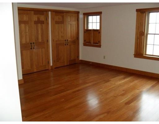 21 North County Road Leyden, MA 01337 - Photo 13 of 20 an empty room with wooden floor and windows