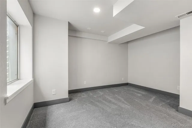 an empty room with a natural light