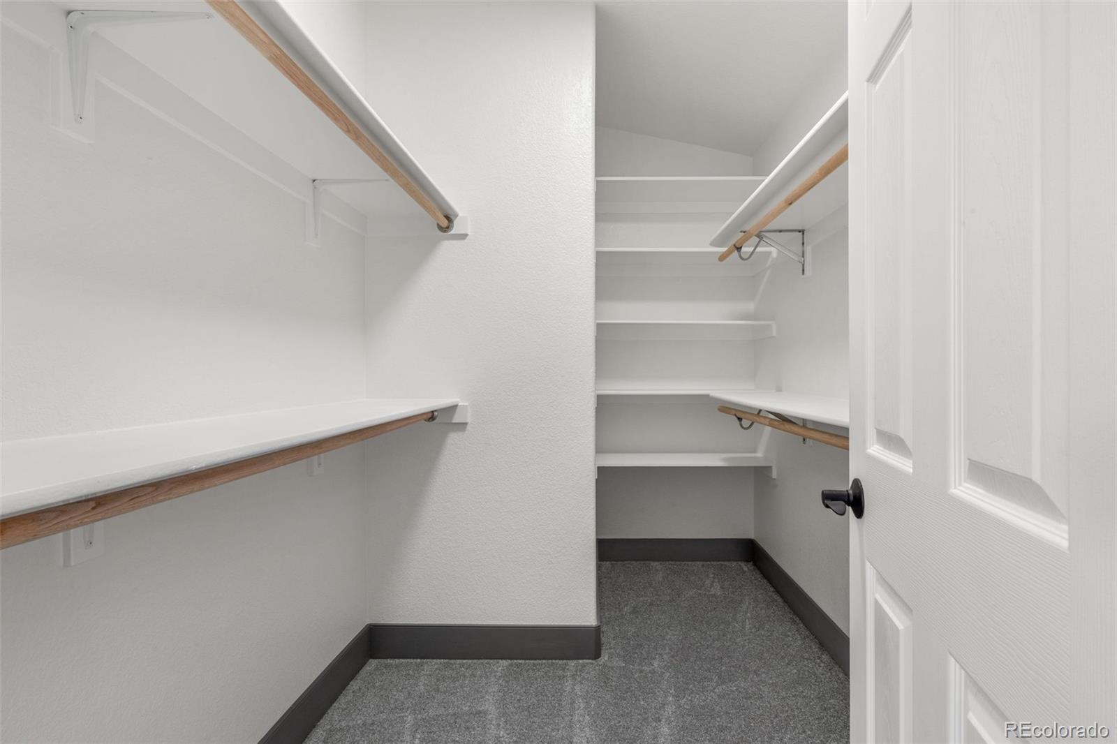 20412 East Chenango Place Aurora, CO 80015 - Photo 19 of 25 a view of an empty walk in closet