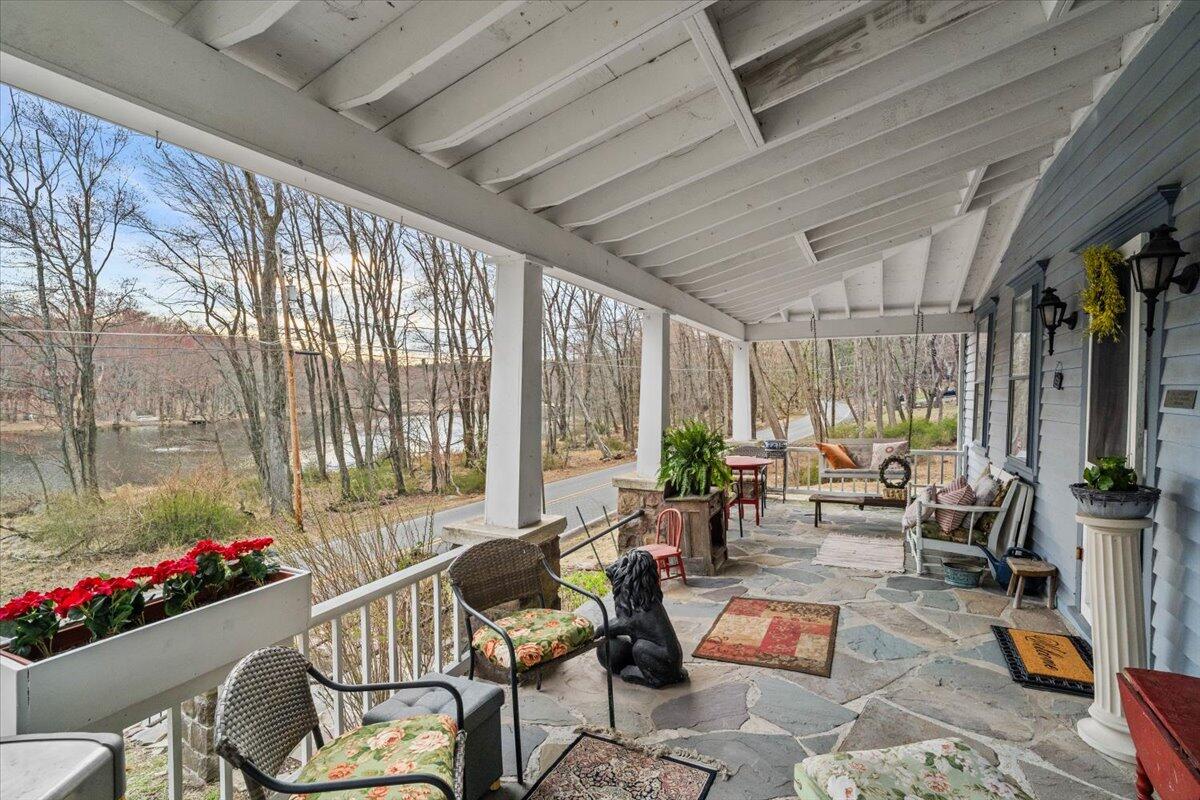 166 Alpine Lake Road Henryville, PA 18332 - Photo 16 of 52 a living room with furniture and a large window