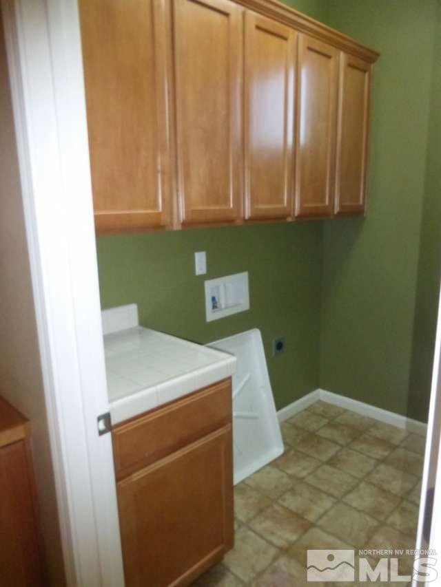 2471 Spring Flower Drive Reno, NV 89521 - Photo 14 of 20 a utility room with dryer and washer