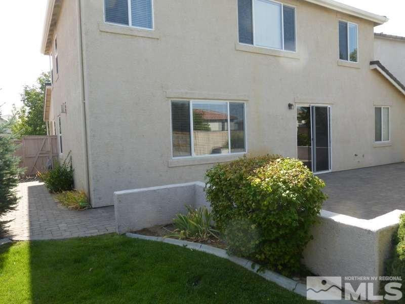 2471 Spring Flower Drive Reno, NV 89521 - Photo 20 of 20 a front view of a house with garden