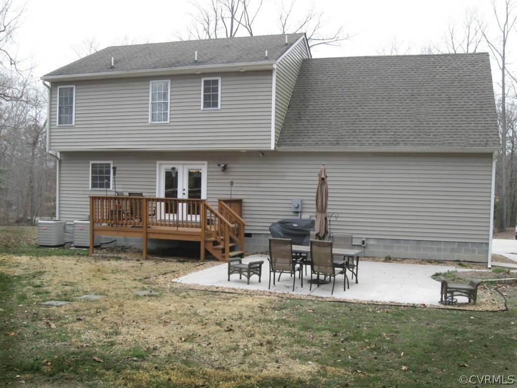 12619 Harrowgate Road Chester, VA 23831 - Photo 8 of 8 a house view with a sitting space and garden