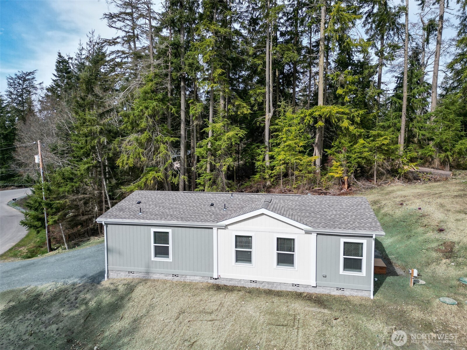 464 Sycamore Road Coupeville, WA 98239 - Photo 2 of 30 front view of a house with a yard