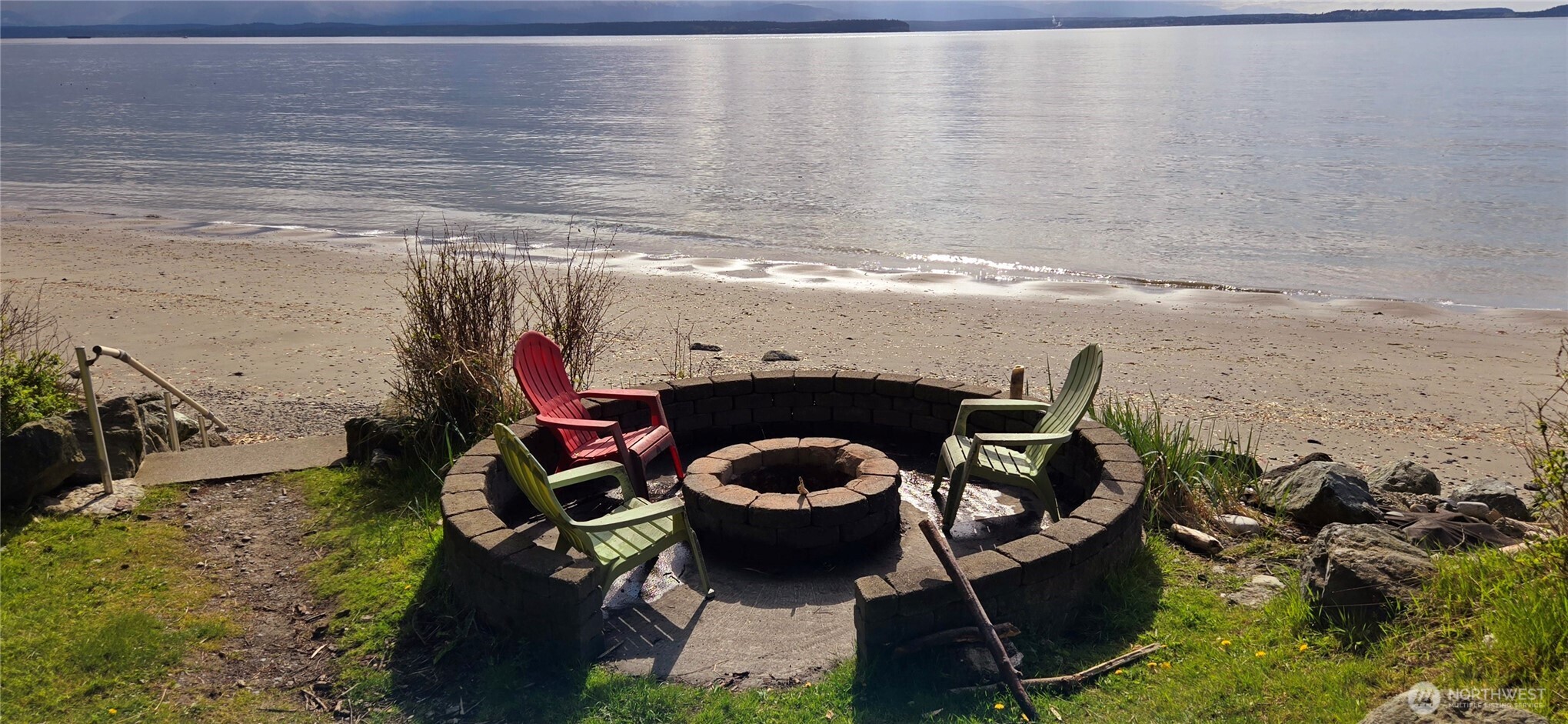 464 Sycamore Road Coupeville, WA 98239 - Photo 28 of 30 a living room with furniture and a fireplace