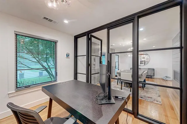 a view of a dining room with furniture window and outside view