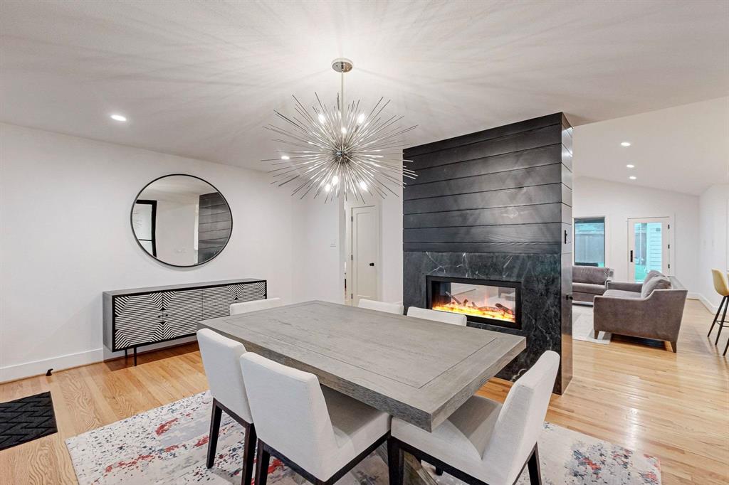 4423 Springside Lane Dallas, TX 75214 - Photo 10 of 40 a living room with furniture and a fireplace