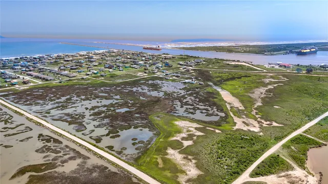 a view of swimming pool with a yard