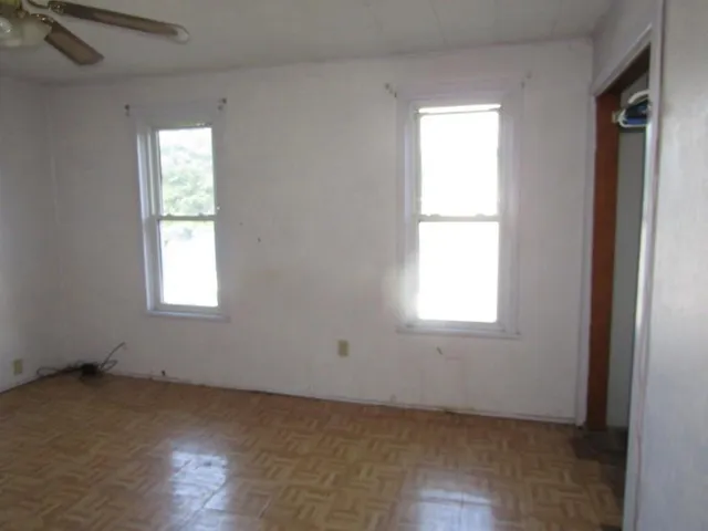 an empty room with a bench