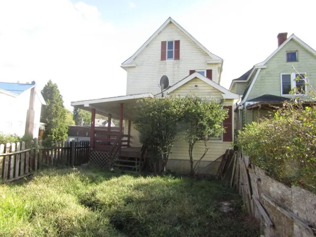 a house view with a garden space