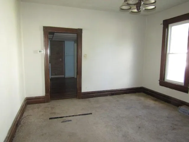 an empty room with window