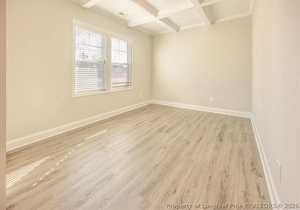 a kitchen with stainless steel appliances granite countertop a stove microwave and sink