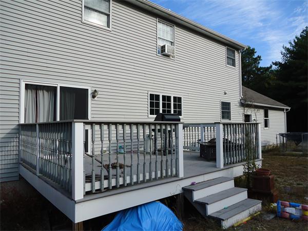 688 Marys Pond Road Rochester, MA 02576 - Photo 3 of 15 a view of a house with wooden floor and a small yard