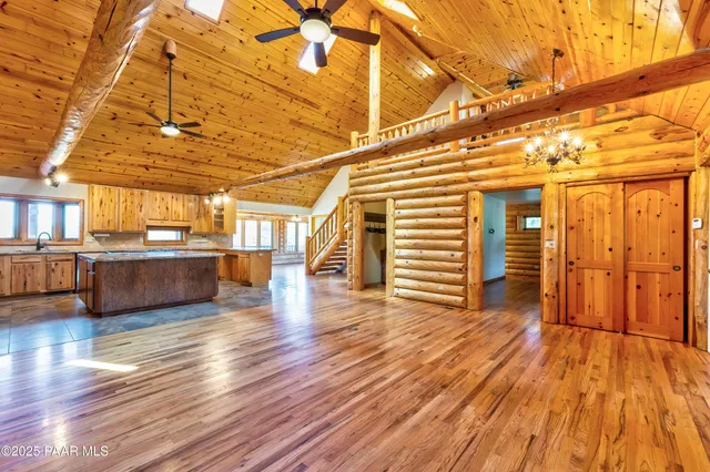 a kitchen with a sink and a refrigerator