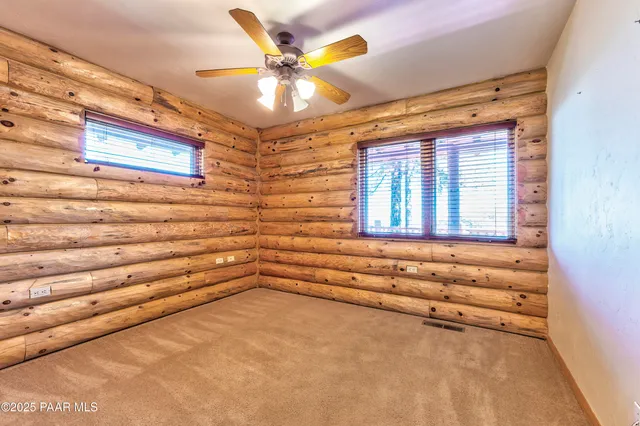 a bathroom with a shower toilet and sink