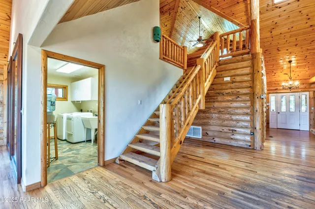 a view of porch with wooden floor and floor to ceiling window