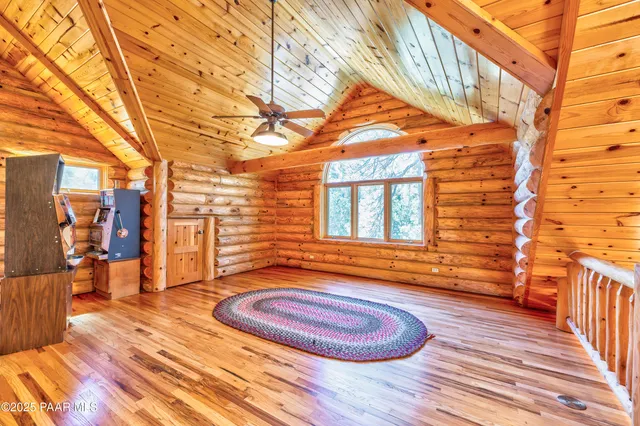 a view of outdoor space with wooden floor and seating area