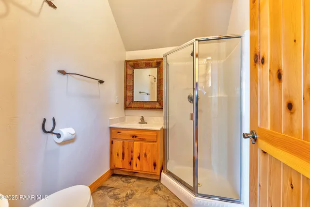 a view of a yard with trees in the background