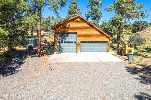 a view of a livingroom with a computer on a table