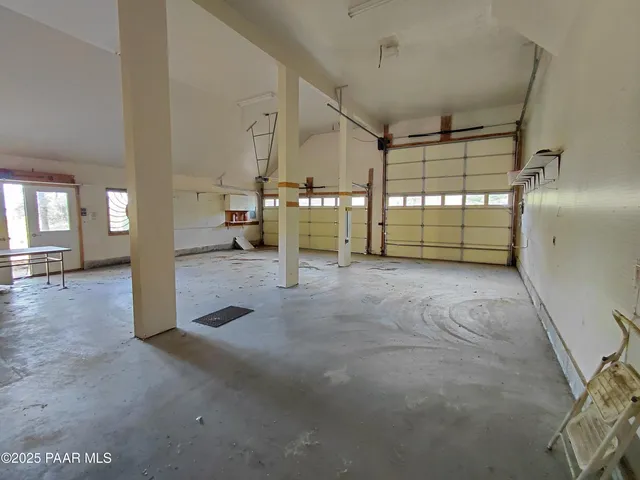 front view of a house with a fence