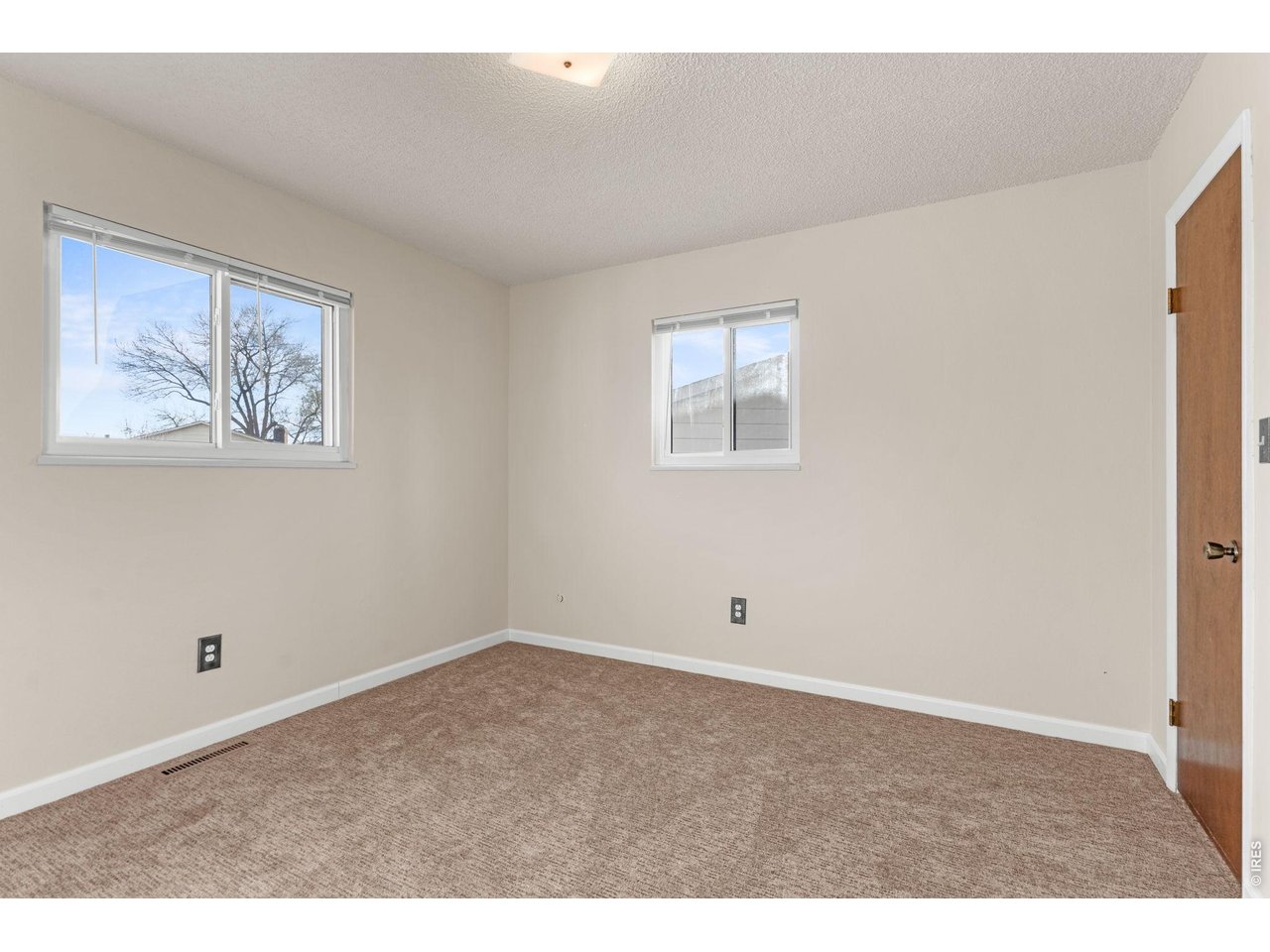 2912 Radcliff Circle Fort Collins, CO 80521 - Photo 21 of 46 a view of an empty room with a window