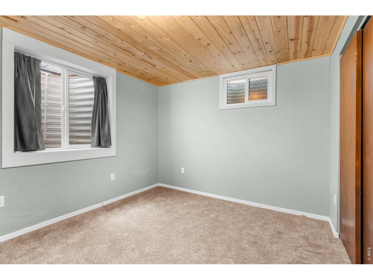 2912 Radcliff Circle Fort Collins, CO 80521 - Photo 29 of 46 a view of an empty room with a window