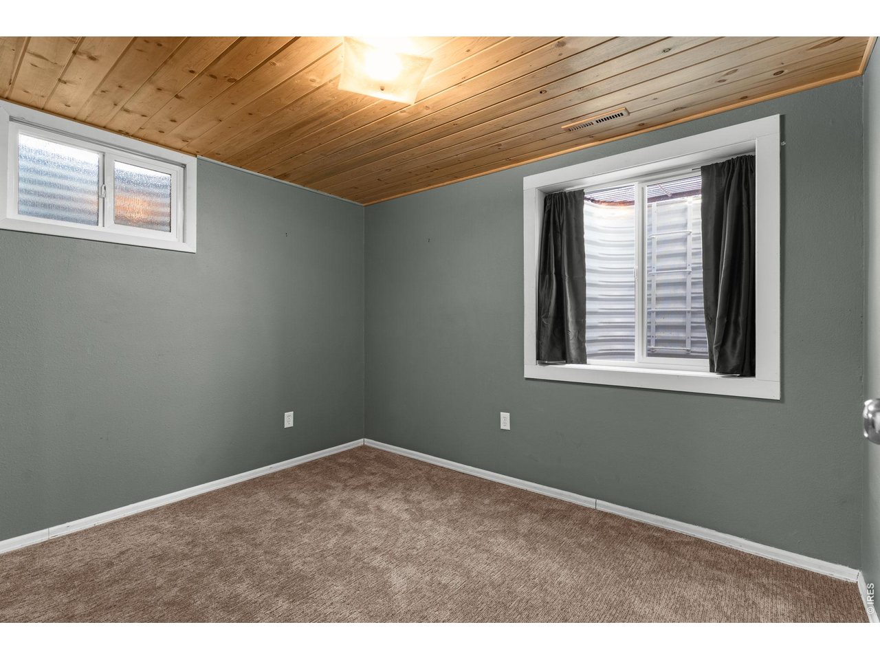 2912 Radcliff Circle Fort Collins, CO 80521 - Photo 32 of 46 a view of an empty room with a window