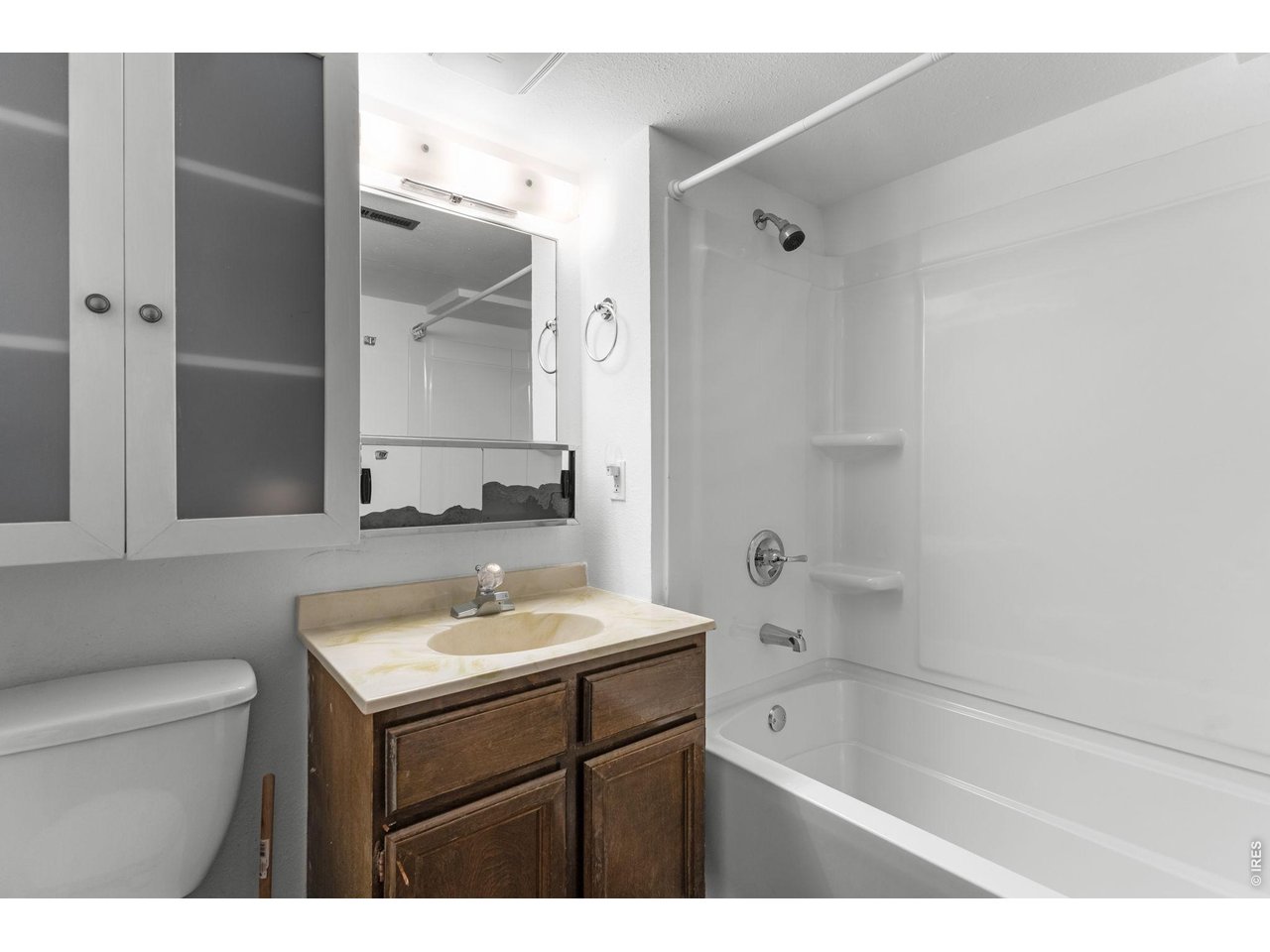 2912 Radcliff Circle Fort Collins, CO 80521 - Photo 35 of 46 a bathroom with a sink a toilet and shower