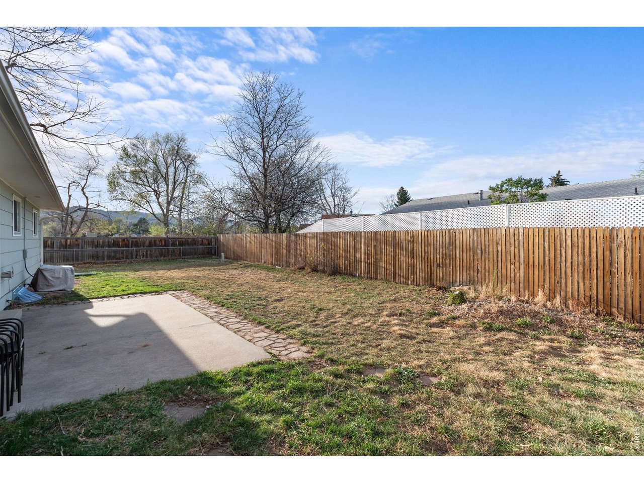 2912 Radcliff Circle Fort Collins, CO 80521 - Photo 45 of 46 a view of a backyard with wooden fence