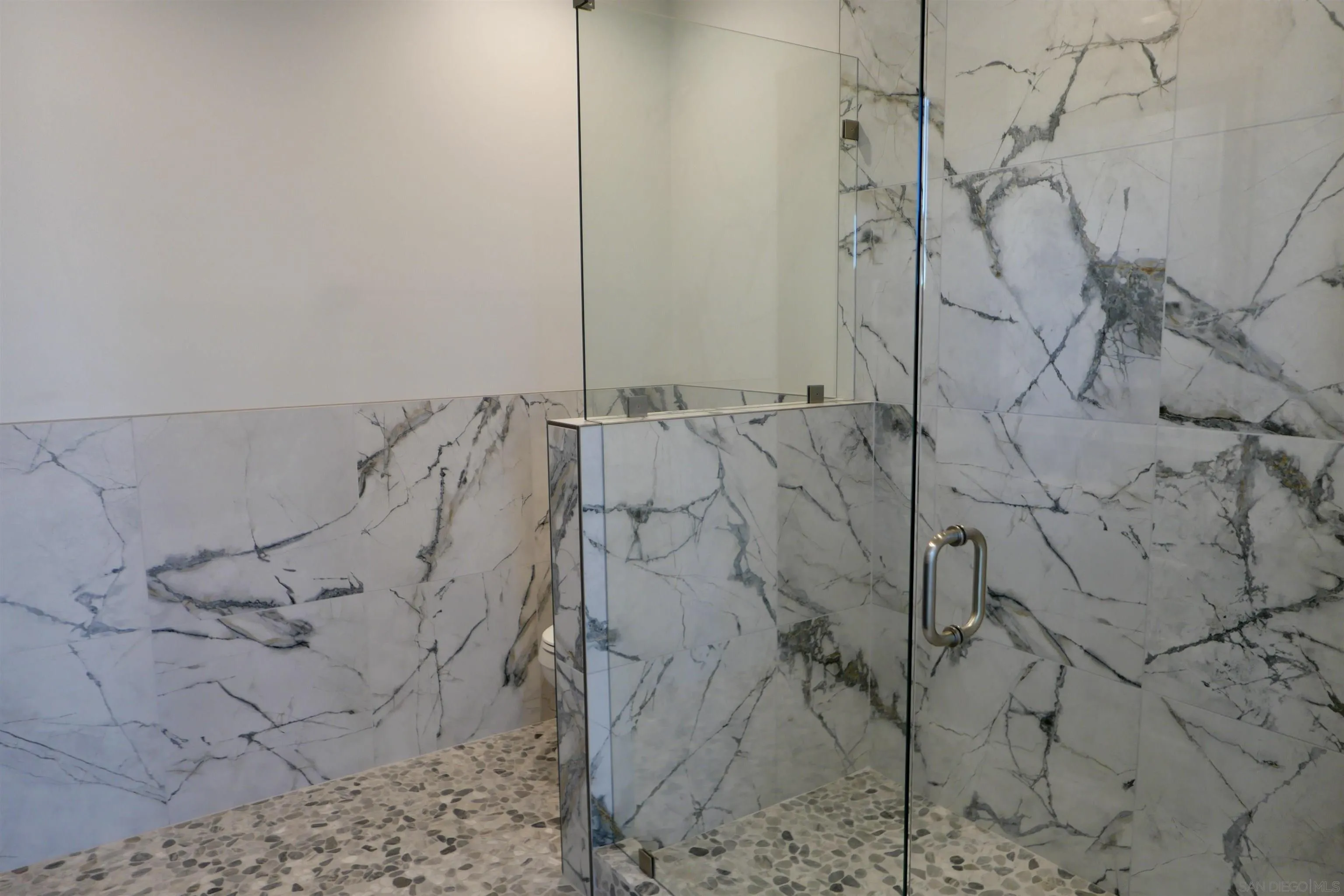 1776 Cable Street San Diego, CA 92107 - Photo 16 of 26 a bathroom with a shower