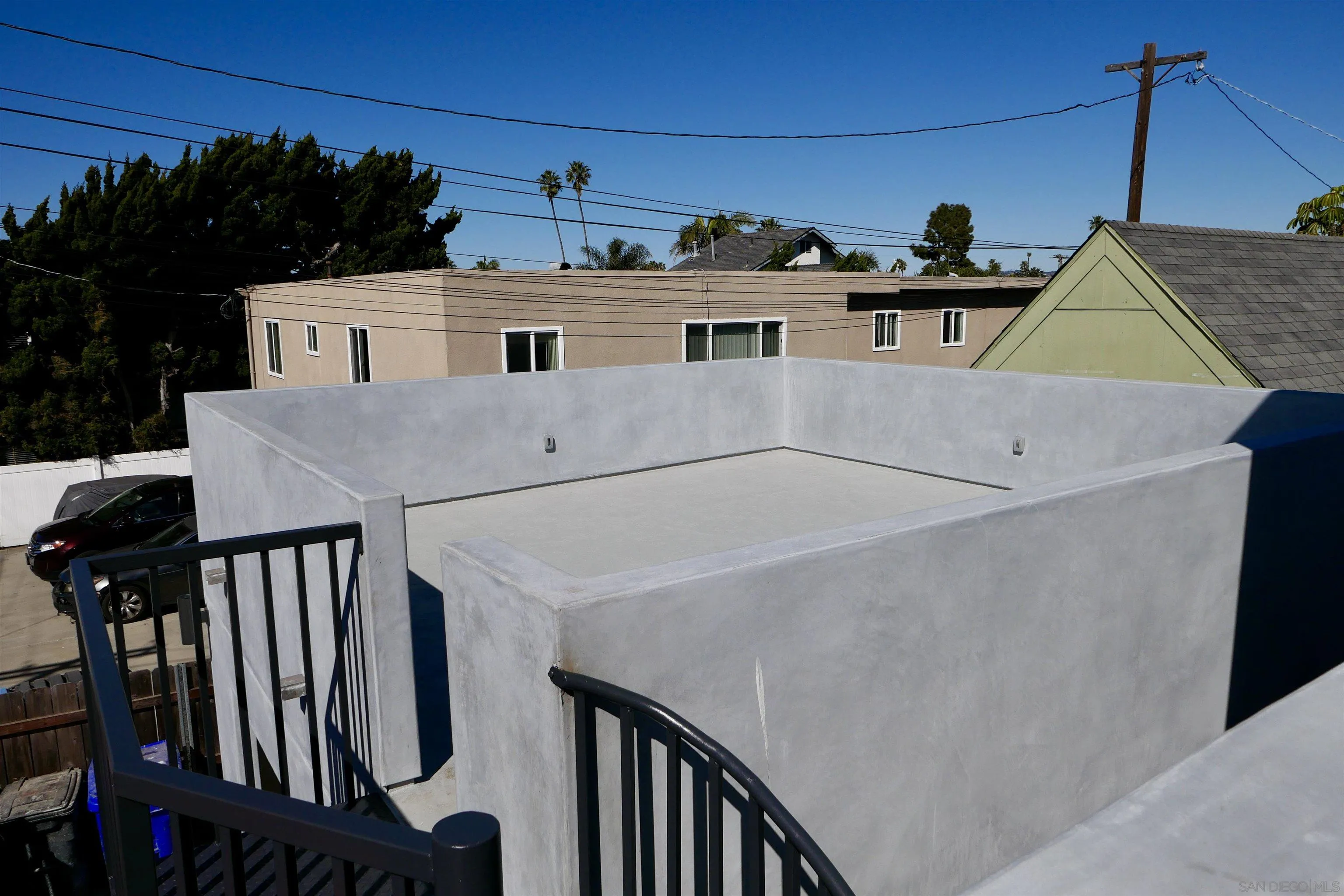 1776 Cable Street San Diego, CA 92107 - Photo 23 of 26 a view of house with roof deck and furniture