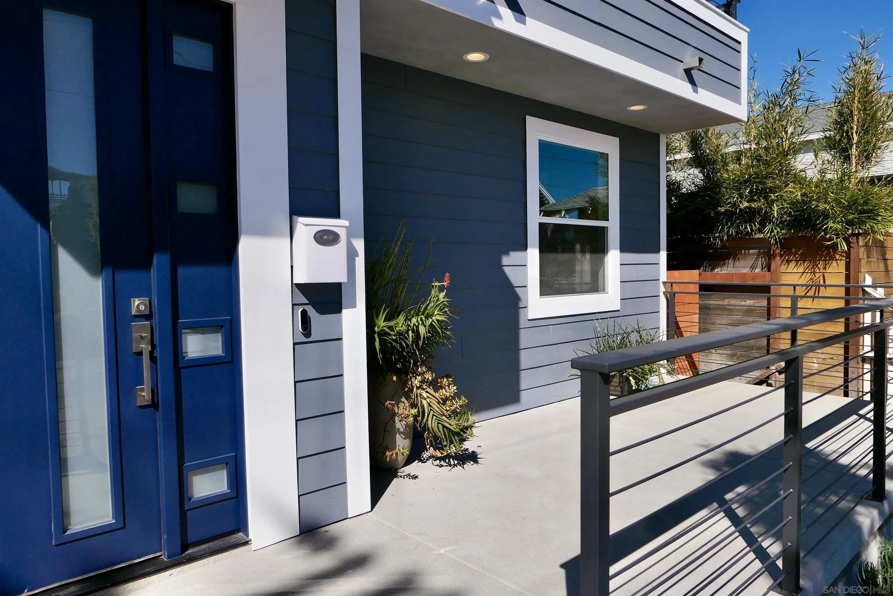 1776 Cable Street San Diego, CA 92107 - Photo 26 of 26 a view of a house with backyard and sitting area