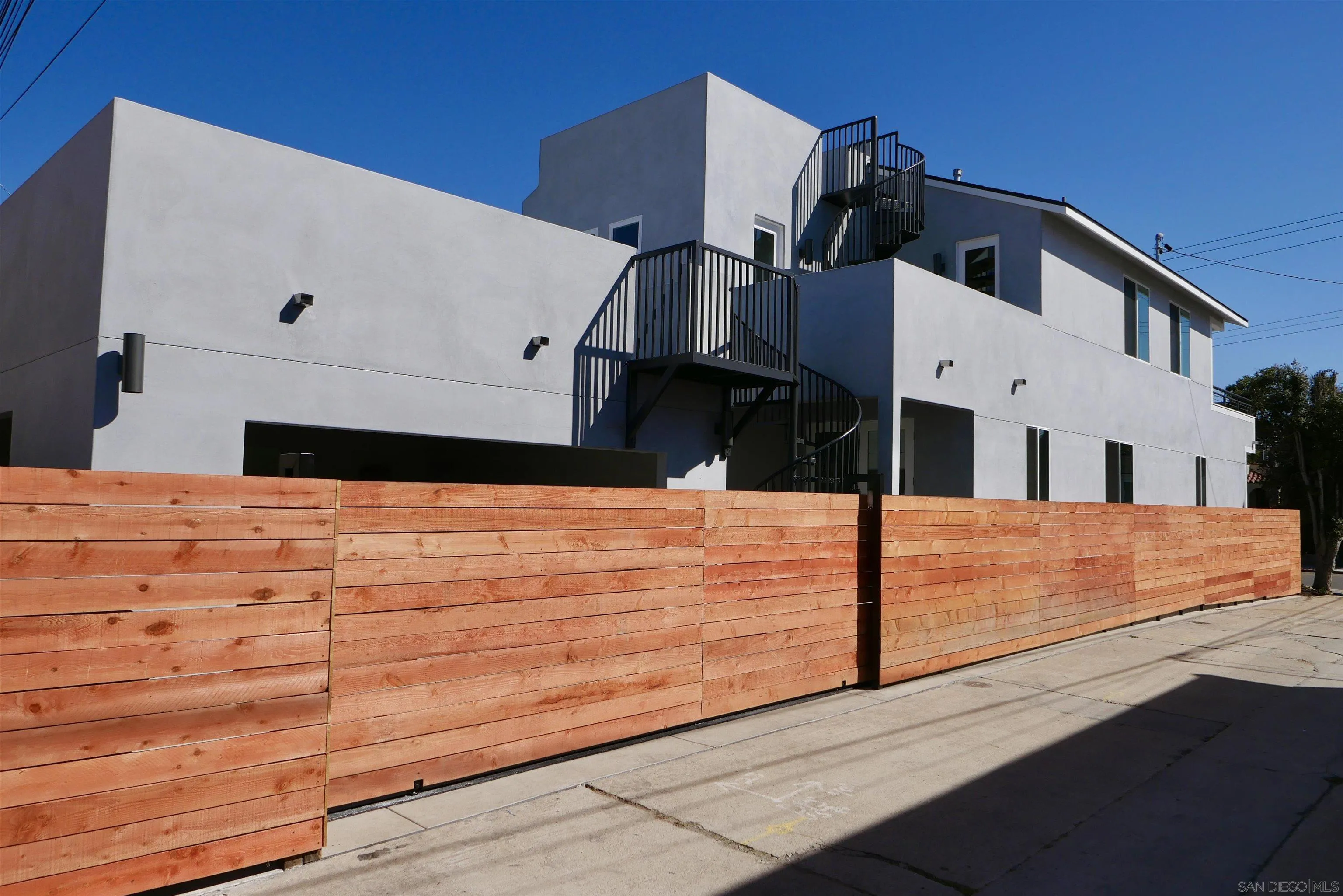 1776 Cable Street San Diego, CA 92107 - Photo 4 of 26 a view of a street with houses