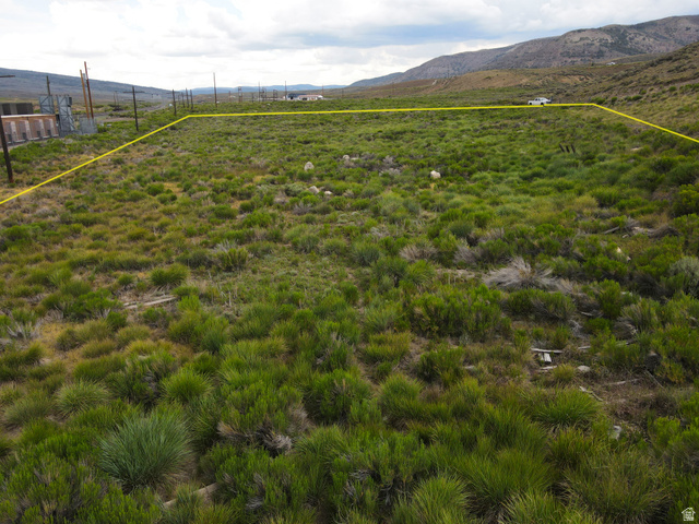 25315 South UDOT Access Road East Helper, UT 84526 - Photo 9 of 20 Expansive parcel featuring natural vegetation and distant hillside terrain