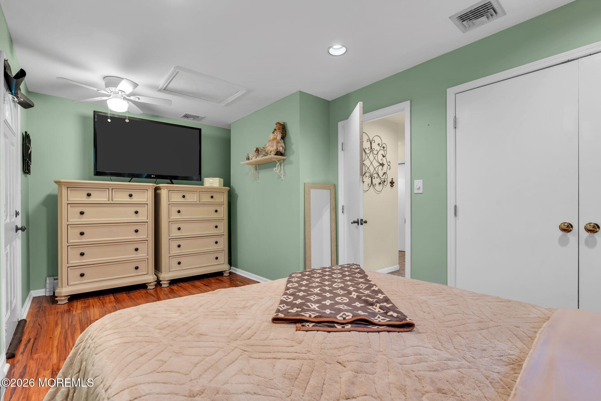 8 Owens Road Marlboro, NJ 07746 - Photo 28 of 39 a bedroom with a bed and a television