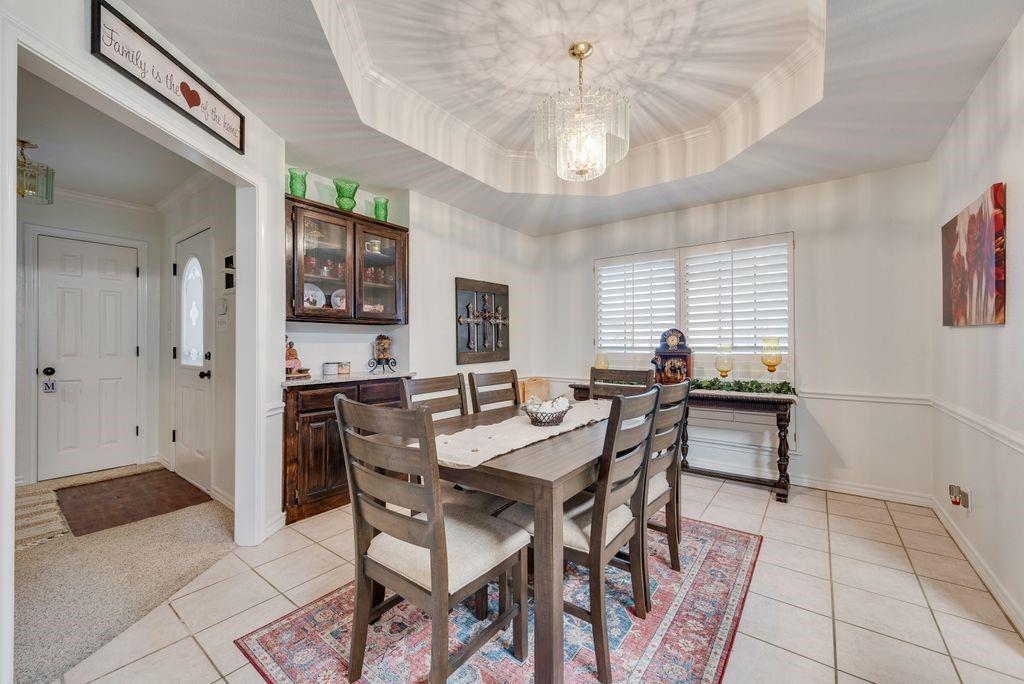 579 South Hitt Street Boyd, TX 76023 - Photo 13 of 34 Dining Area with built in Coffee Bar, Buffet or China cabinet and Tray Ceiling