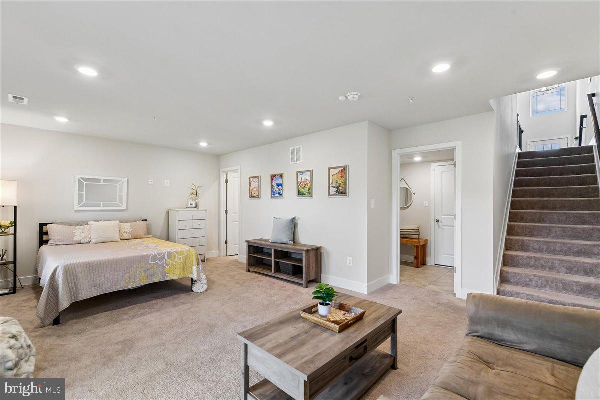 2209 Woodlands Road Windsor Mill, MD 21244 - Photo 42 of 75 SPACIOUS ROOM W/ RECESSED LIGHTS & NEUTRAL CARPET