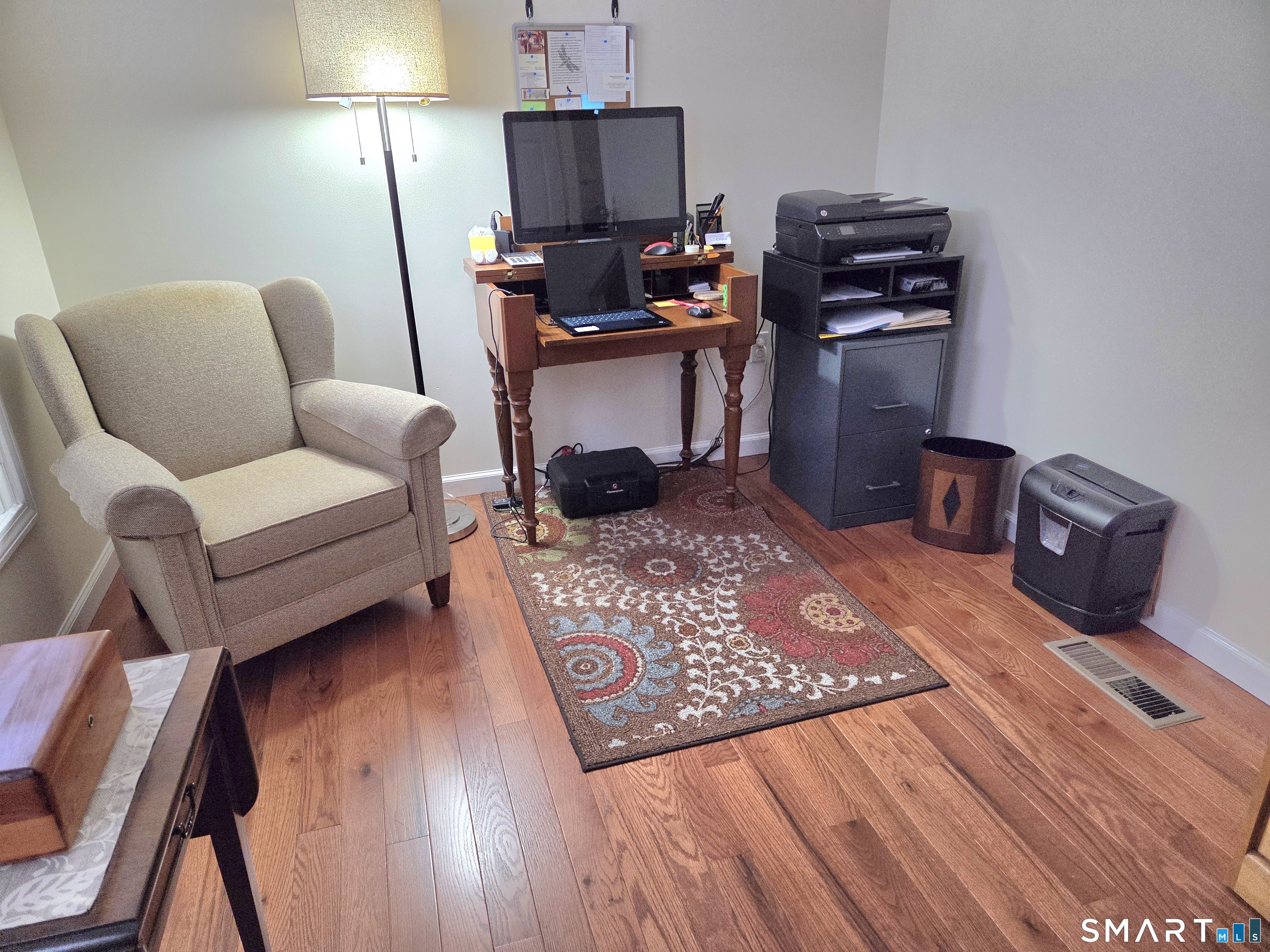 6 Whitman Lane, Unit 6 Vernon, CT 06066 - Photo 13 of 28 a living room with furniture a flat screen tv and a rug