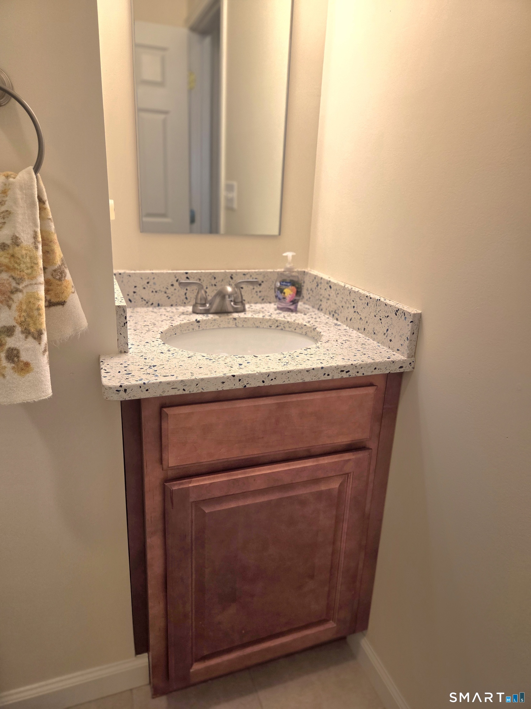 6 Whitman Lane, Unit 6 Vernon, CT 06066 - Photo 15 of 28 a bathroom with a granite countertop sink and a mirror