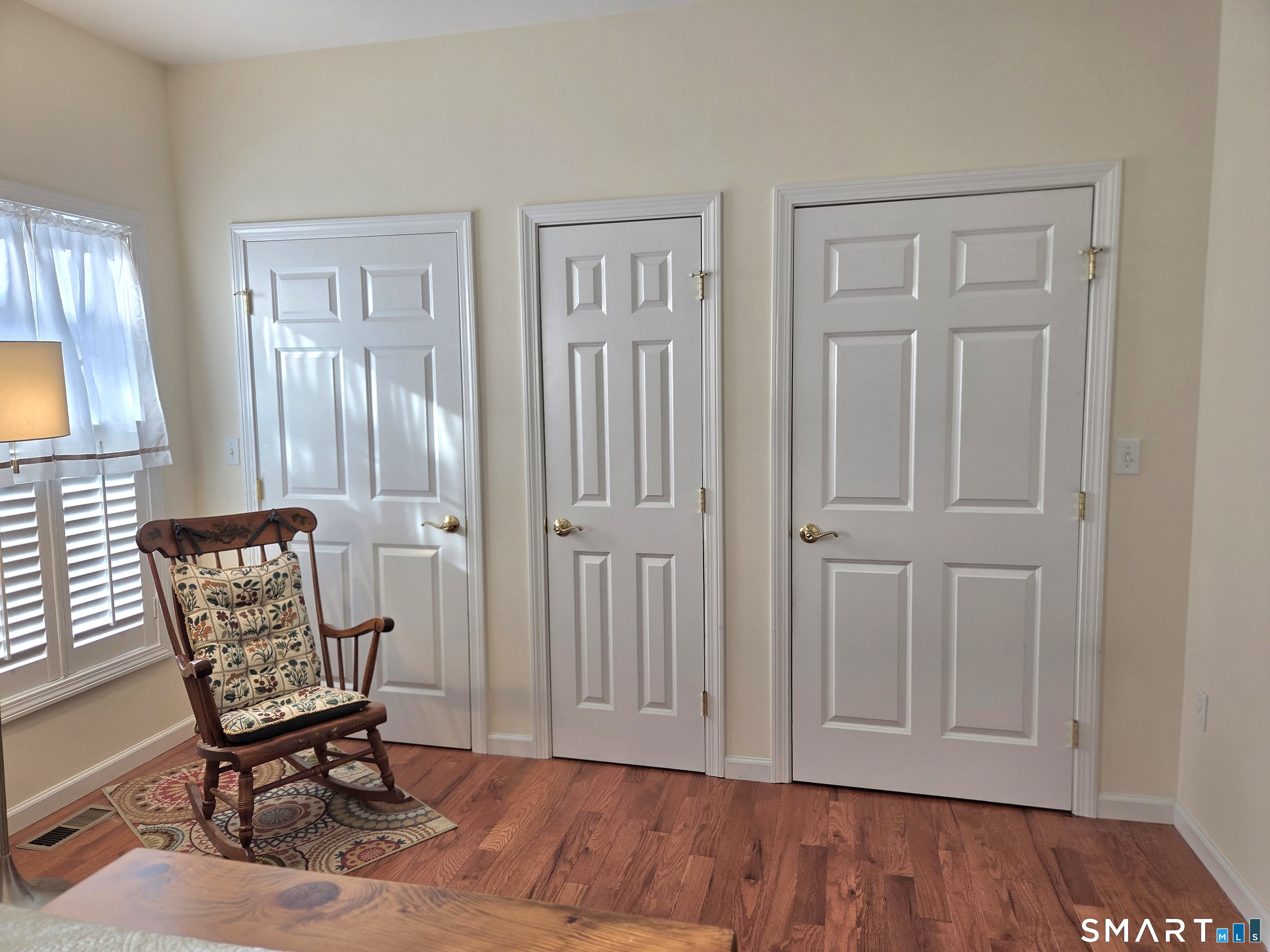 6 Whitman Lane, Unit 6 Vernon, CT 06066 - Photo 18 of 28 a view of a livingroom with furniture and a chair
