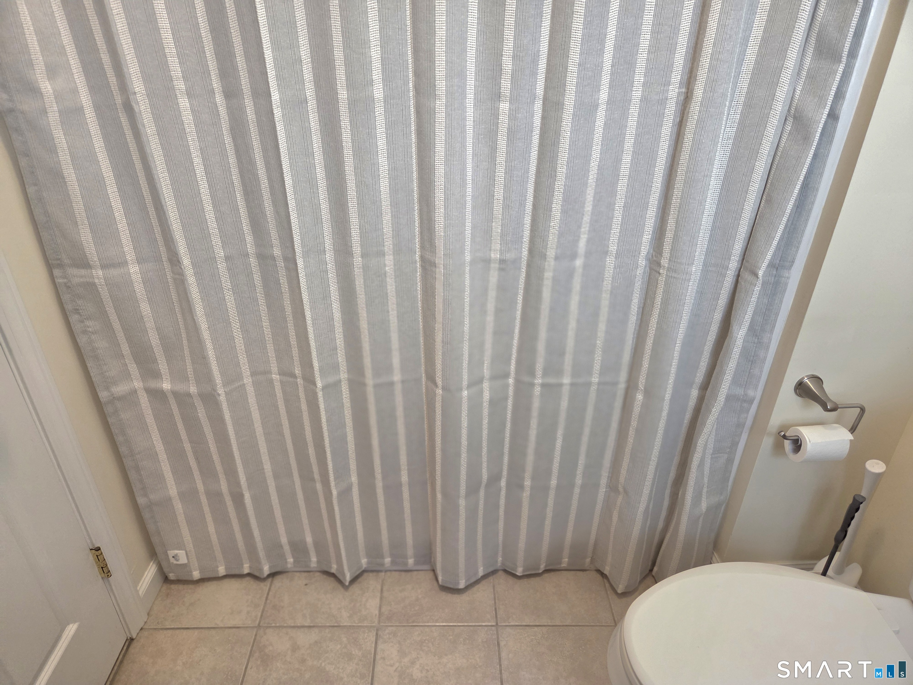 6 Whitman Lane, Unit 6 Vernon, CT 06066 - Photo 20 of 28 a bathroom with a toilet and shower