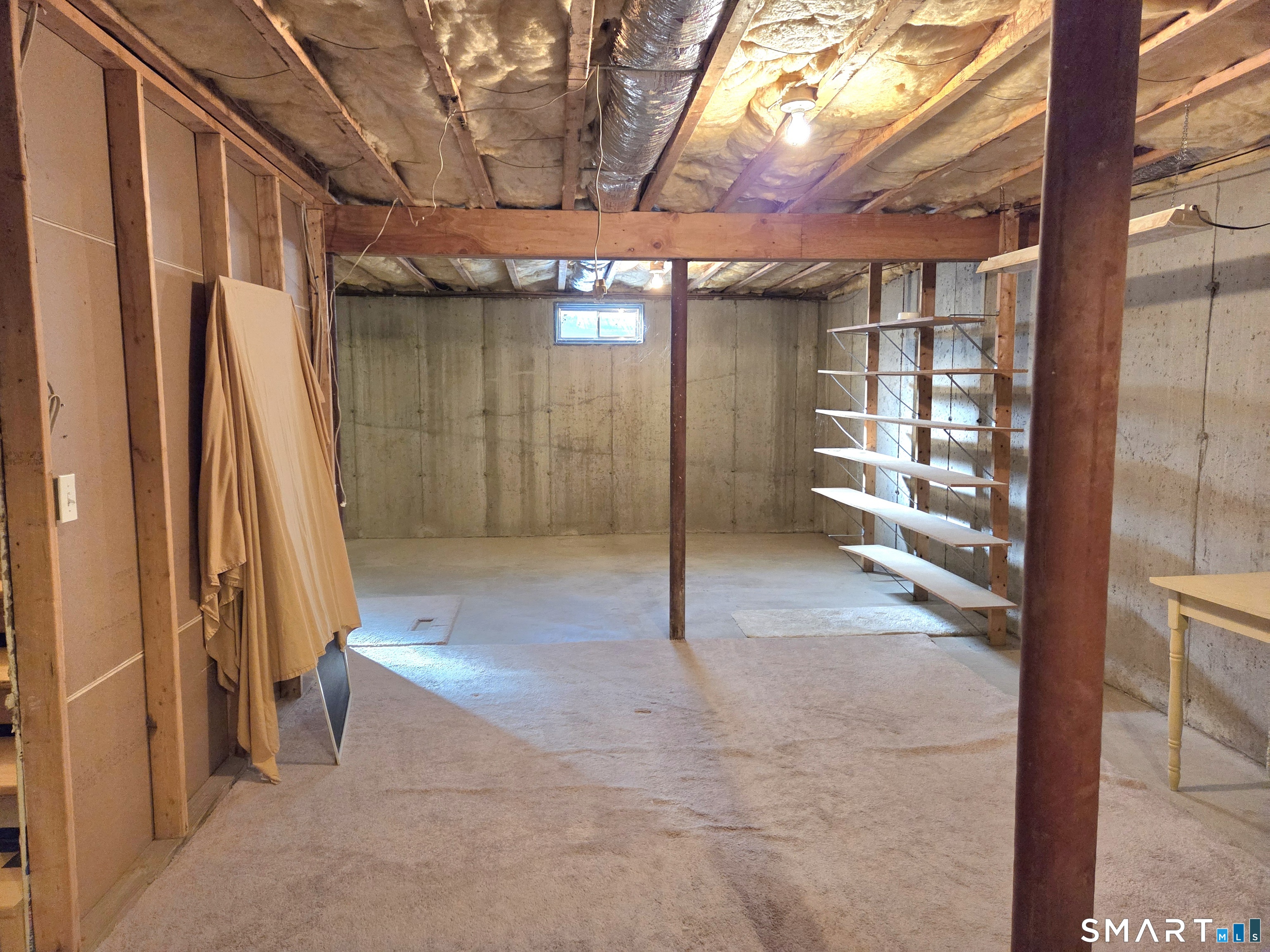 6 Whitman Lane, Unit 6 Vernon, CT 06066 - Photo 26 of 28 a view of a room with wooden walls