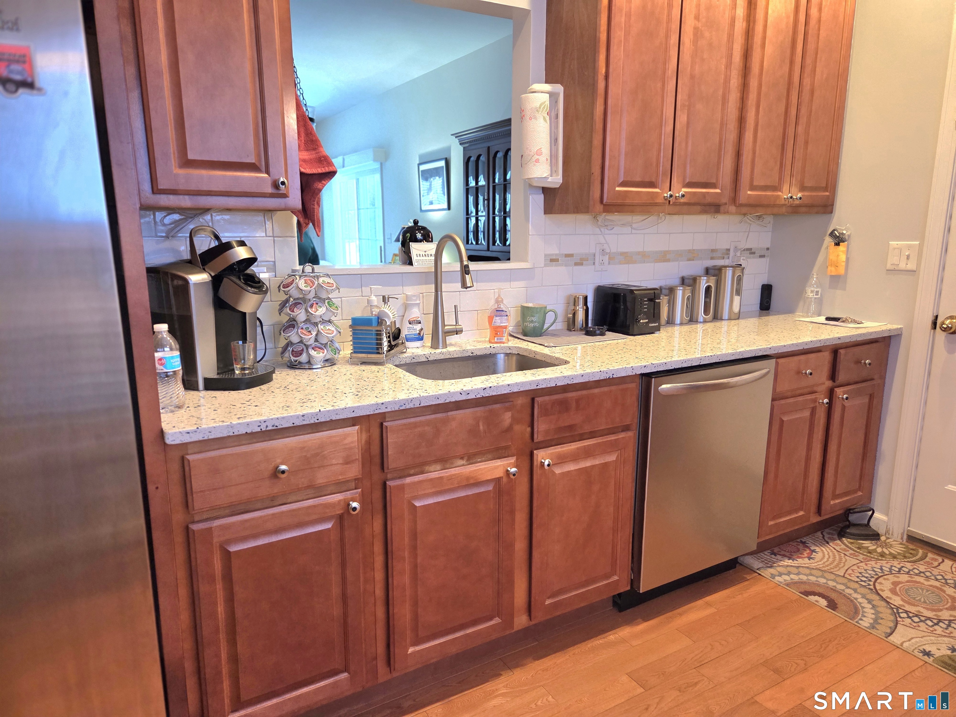 6 Whitman Lane, Unit 6 Vernon, CT 06066 - Photo 6 of 28 a kitchen with stainless steel appliances granite countertop a sink dishwasher stove and cabinets