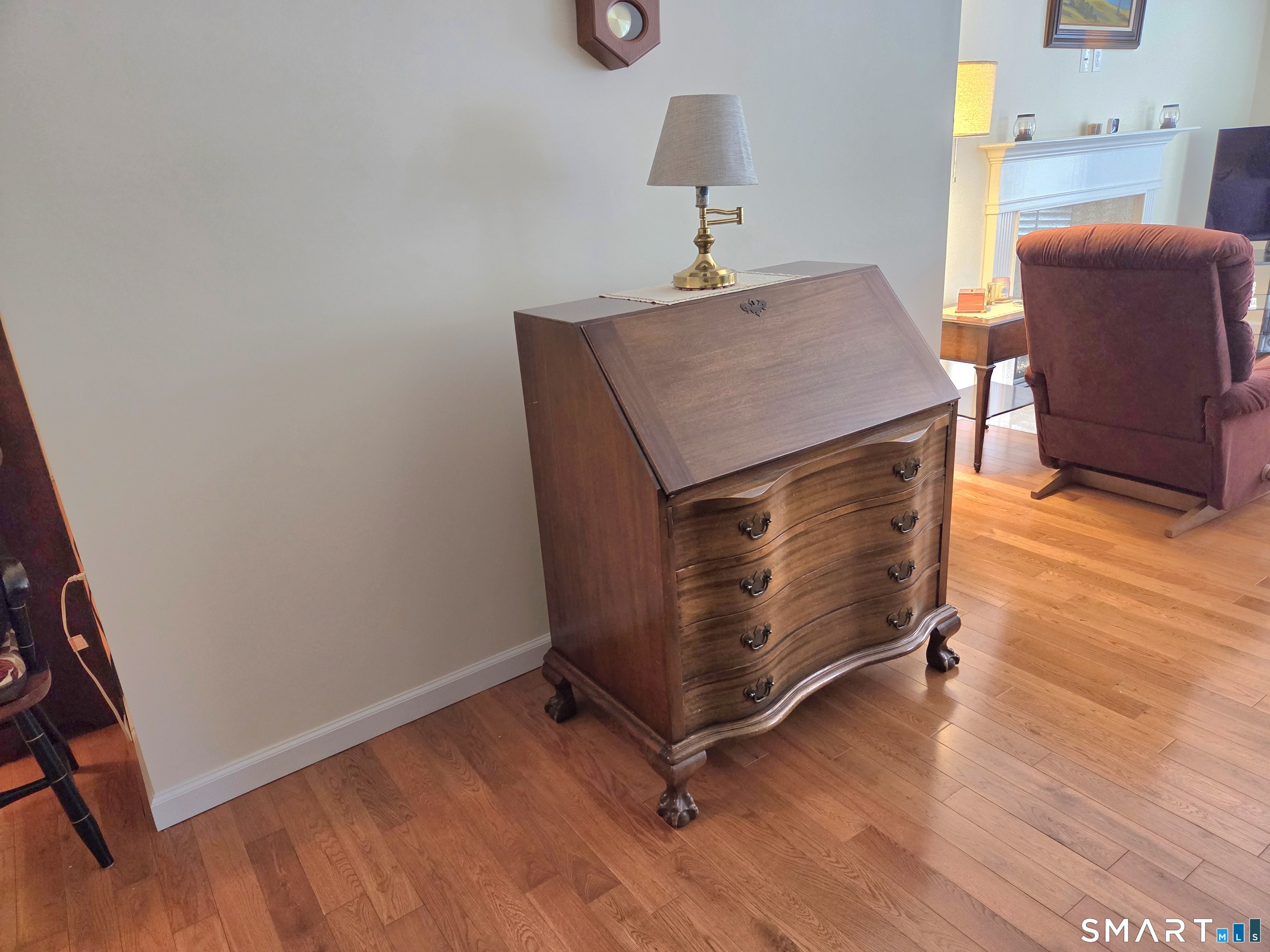 6 Whitman Lane, Unit 6 Vernon, CT 06066 - Photo 8 of 28 a room with furniture and a wooden floor