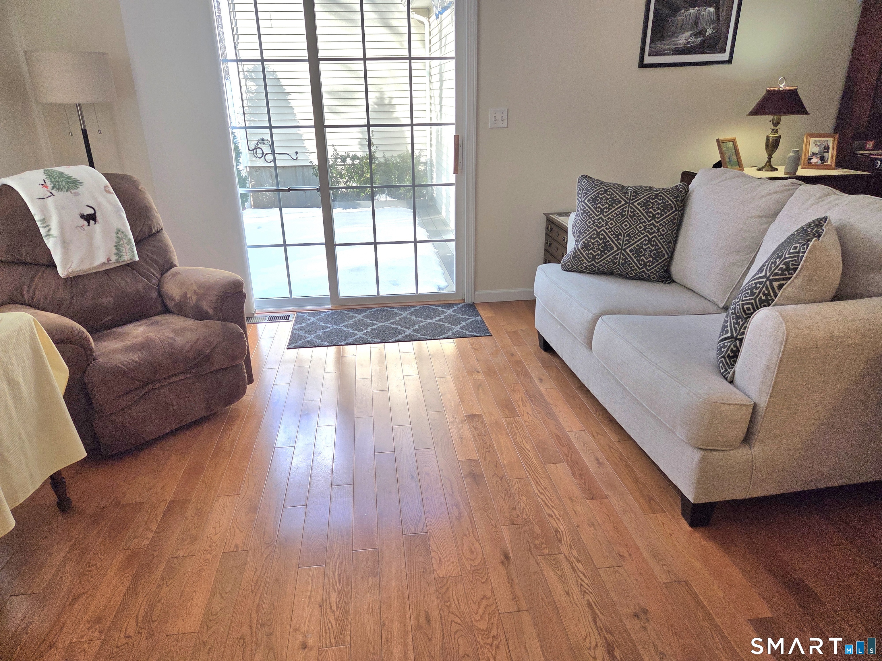 6 Whitman Lane, Unit 6 Vernon, CT 06066 - Photo 10 of 28 a living room with furniture and a large window