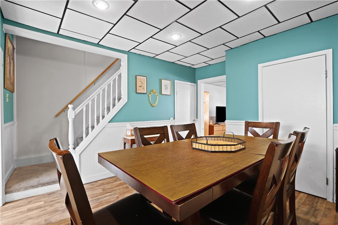 431 Pierce Street Bethlehem, PA 18015 - Photo 7 of 27 An inviting dining space with durable flooring and convenient staircase access.