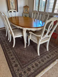 a dining room with furniture