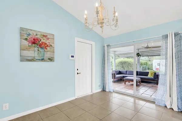 a view of a livingroom with furniture window and outside view