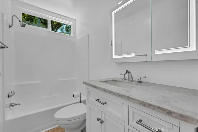 a view of cabinets and window