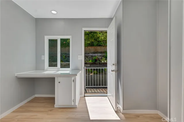 a view of balcony and yard